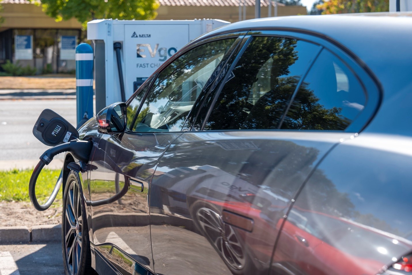 Photo of an electric vehicle being charged.