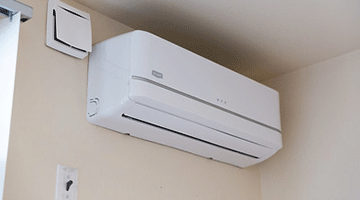 Room A/C unit mounted on the wall