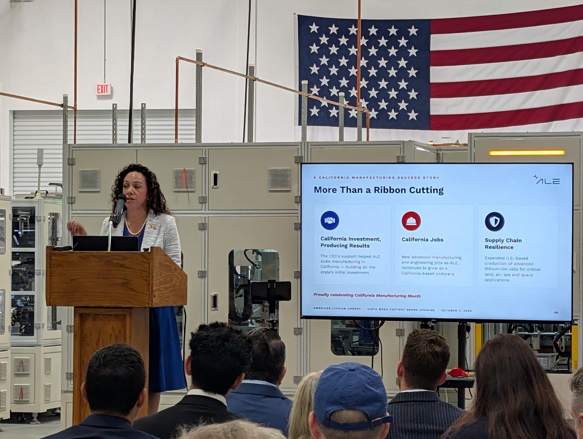 California Energy Commission Commissioner Noemí Gallardo, stands at the podium to give a presentation during the American Lithium Energy factory opening.