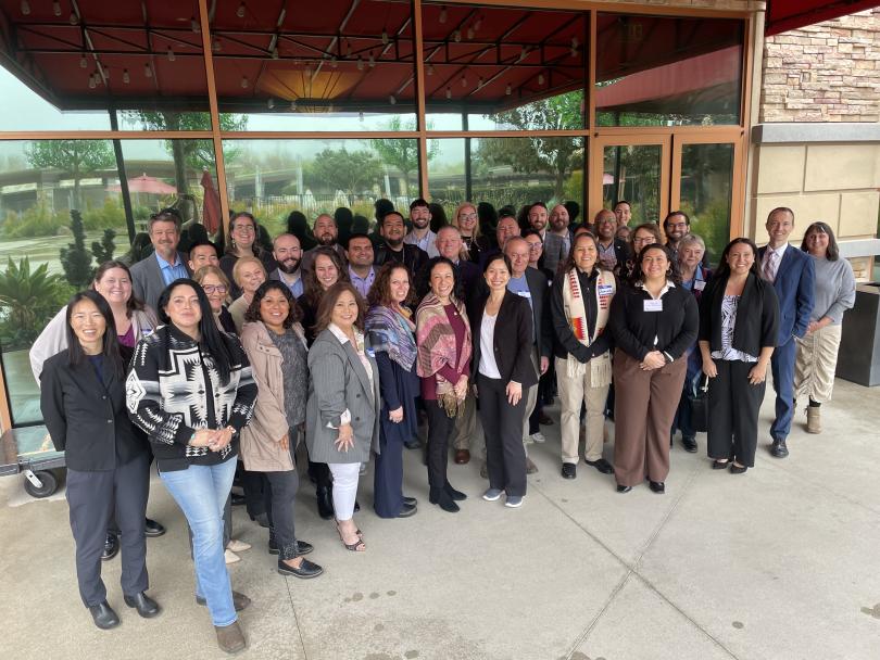Pala Band of Mission Indians, the Tribal Energy Climate Collaborative, and the California Public Utilities Commisson, the California Energy Commission individuals Standing in a group in front of the event bulding.