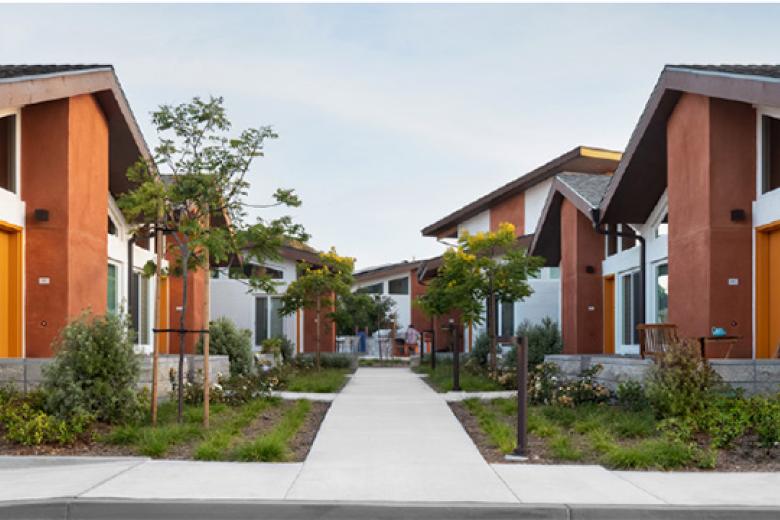 Sidewalk in front and down the middle of the Levant Senior Cottages